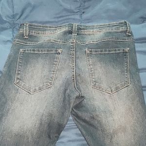 2 pair of blue jeans one is longer Capri pants